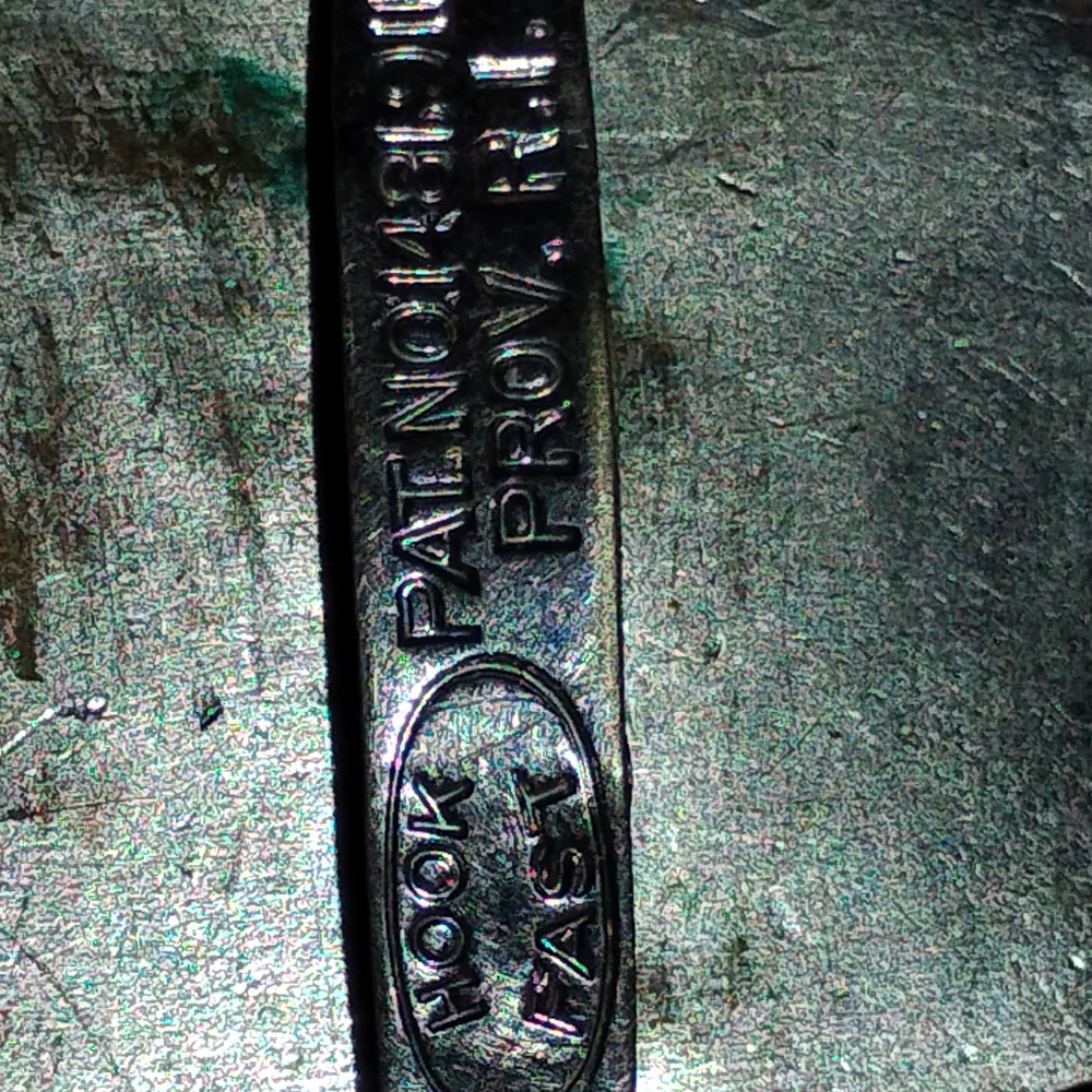Black Industrial Metal Belt with Engraved Design